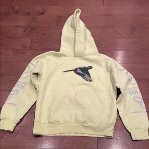 TNA Golden Hoodie with Bird Graphic